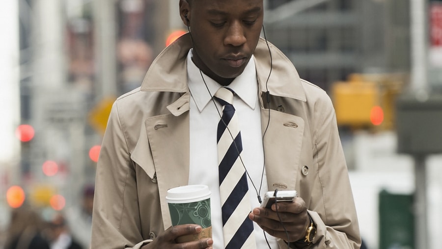 Person using the available FordPass™ App on a mobile device