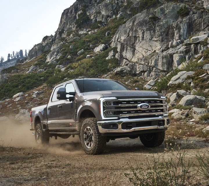 2023 Ford Super Duty® Tremor® model being driven on a mountain dirt path