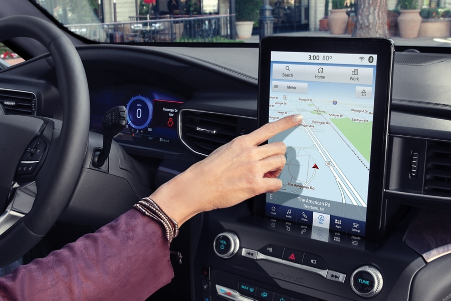 A driver using the available Navigation System