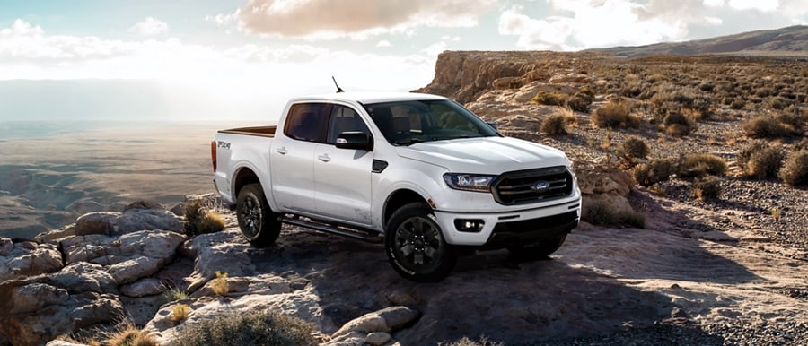 2023 Ford Ranger® STX in Oxford white with black appearance package on a cliff