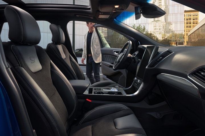 Interior of a 2023 Ford Edge® ST model with leather-trimmed seats and perforated Miko® inserts