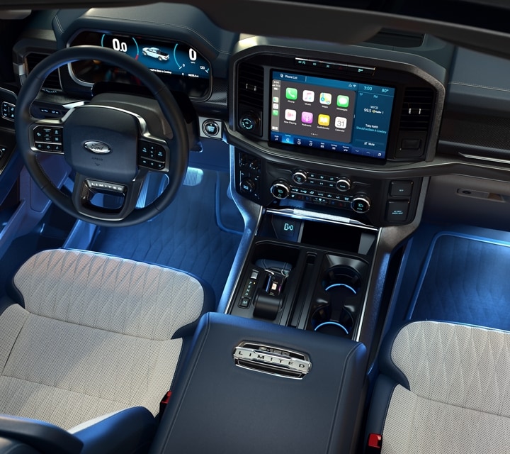 Overhead view of a 2022 Ford F-150 interior with ambient lighting in cool Ice Blue