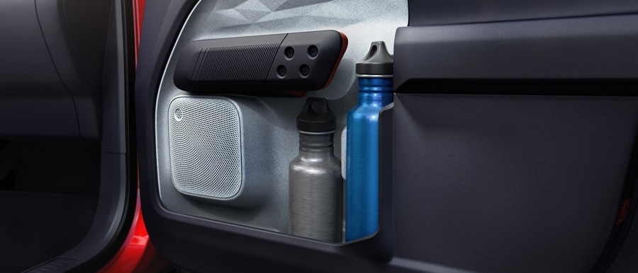 Door-pocket storage of the 2023 Ford Maverick® truck holding two water bottles