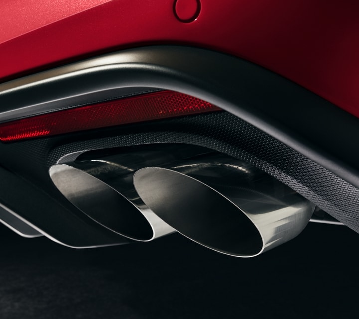Close-up of the rear of a 2023 Ford Mustang® model with dual exhaust and quad tips