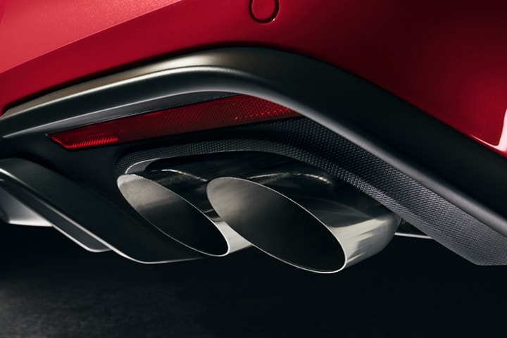 Close-up of the rear of a 2023 Ford Mustang® model with dual exhaust and quad tips
