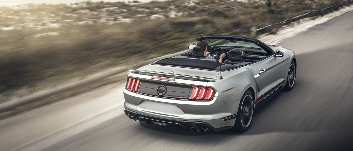 2023 Ford Mustang® convertible being driven down a highway