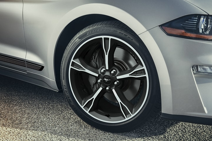 Close-up of a 2023 Ford Mustang® California Special 5-spoke wheel