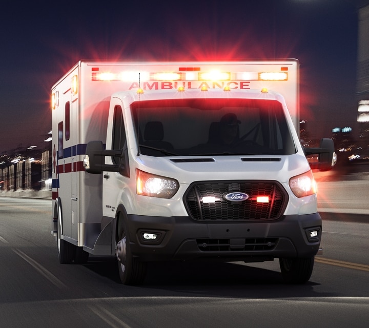 2023 Ford Transit® Cutaway equipped with Ambulance Prep Package being driven at night