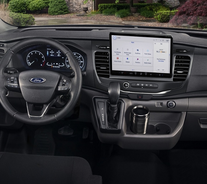 Close up of the 2023 Ford Transit® van steering wheel and dashboard.