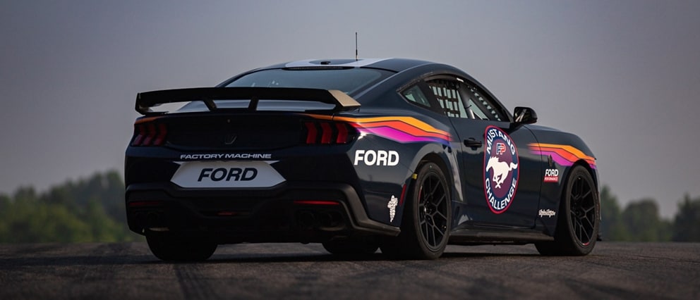 Ford Mustang® Dark Horse™ R race car parked on a closed course