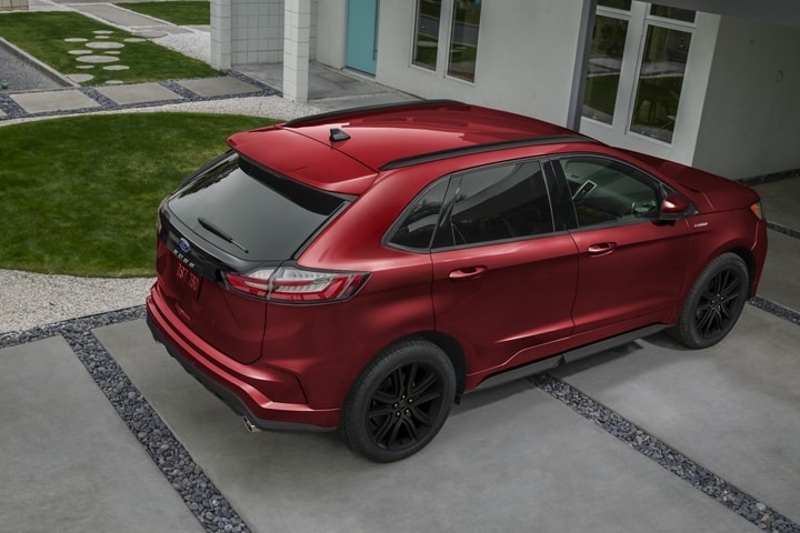 2023 Ford Edge® SUV in Rapid Red with black roof-rack side rails