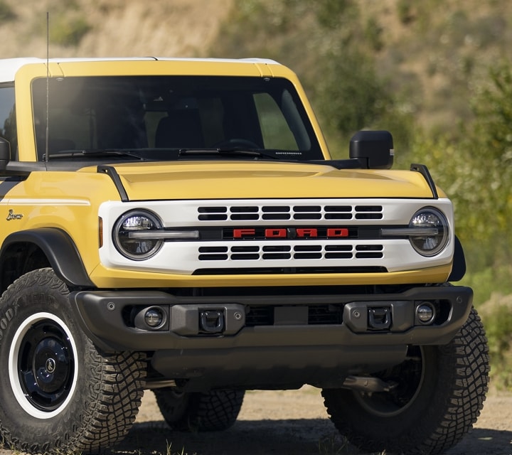 Photo of a 2023 Ford Bronco® Heritage® Limited Edition in Yellowstone Metallic in the desert