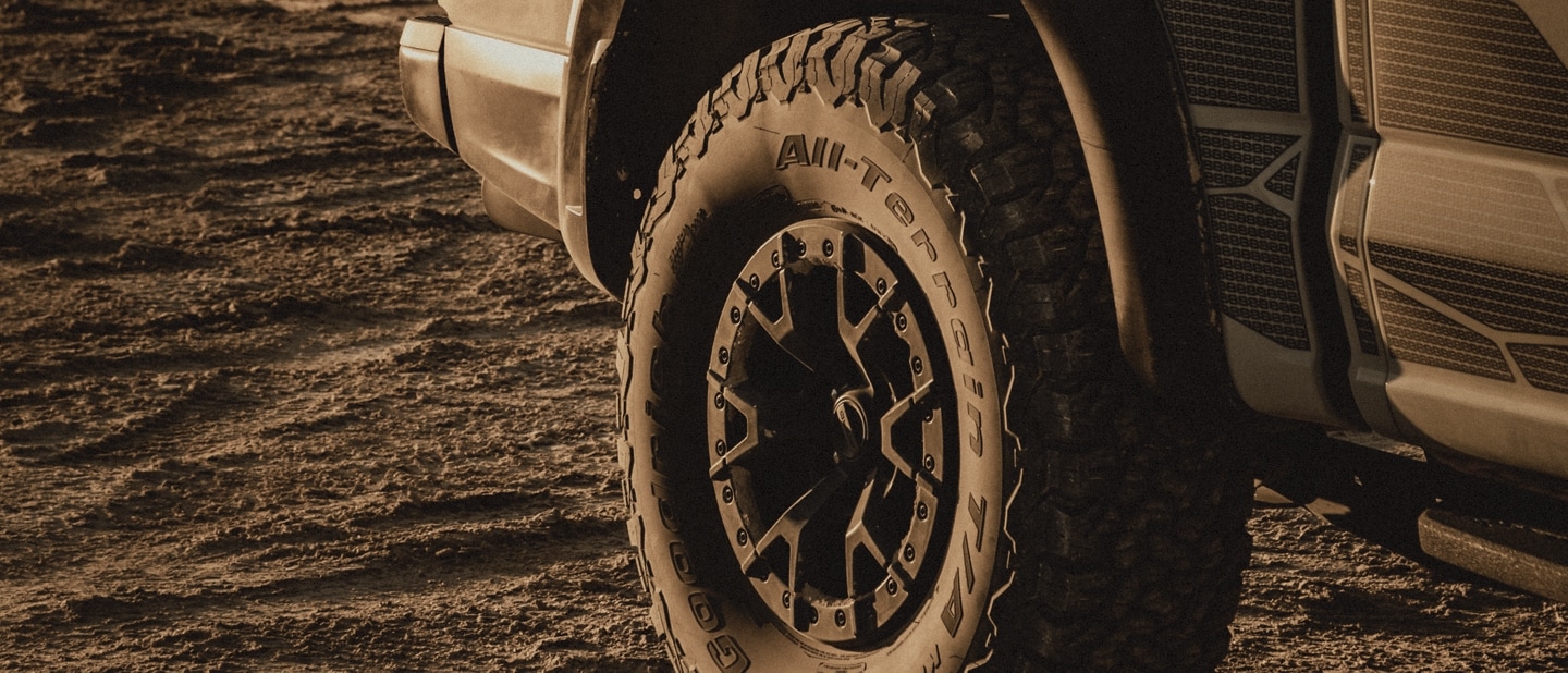 Close-up of the bead-lock wheels with 37 inch all-terrain tires on the 2023 Ford F-150® Raptor R™