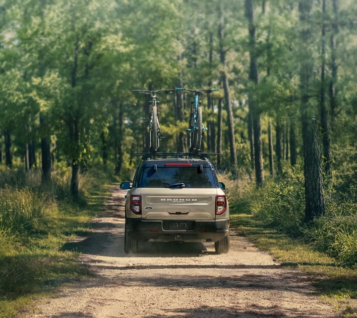 A 2024 Ford Bronco® Sport being driven on a dirt road