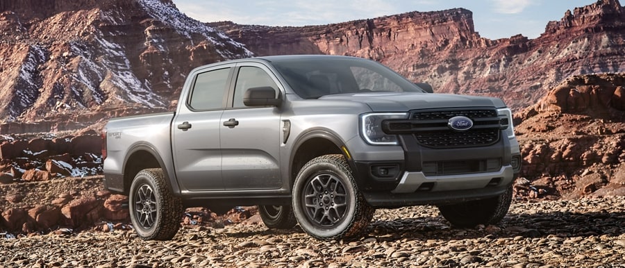 A 2024 Ford Ranger® truck is parked on rocks in a canyon location