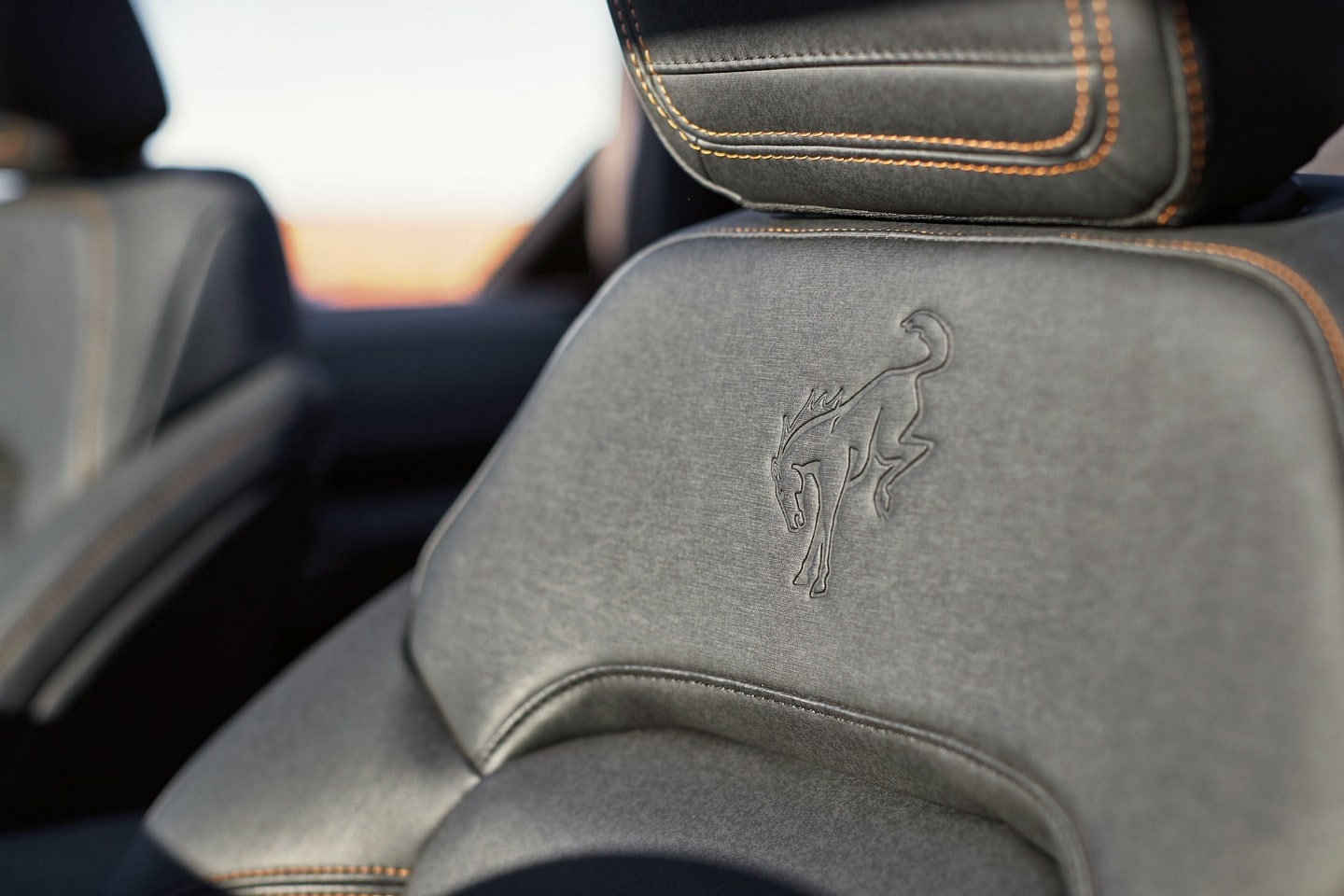 Close-up photo of the Bronco® logo embossed on the headrest
