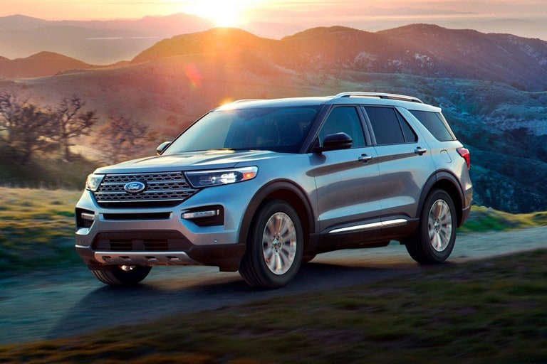 2023 Ford Explorer SUV being driven on a hilly dirt road