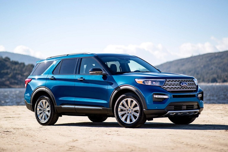 2023 Ford Explorer® Limited Hybrid model parked by the water