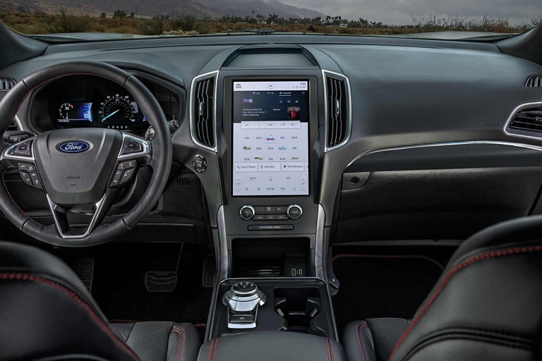 Leather-wrapped steering wheel with red stitching on the 2023 Ford Edge® ST-Line SUV