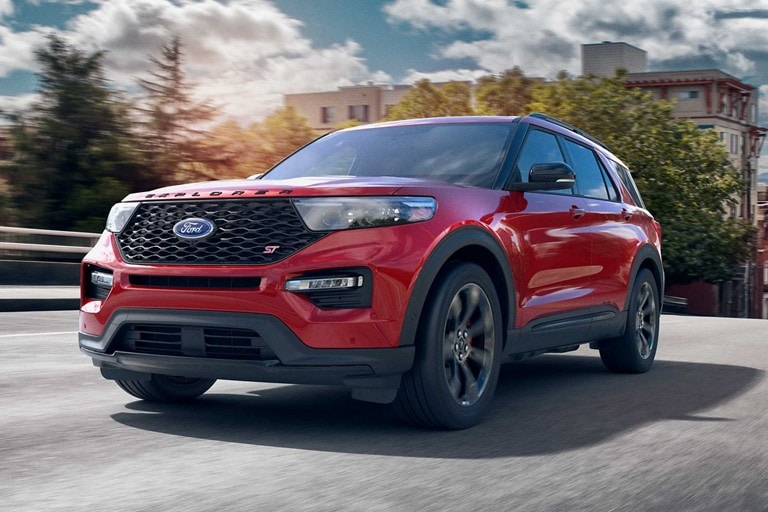 2021 Ford Explorer ST being driven through a small town 