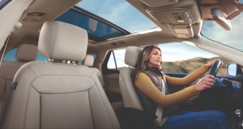 Woman driving 2020 Ford Explorer Limited